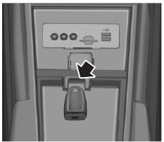 1. Place the new unprogrammed intelligent access key, with the buttons facing