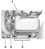 2. Clean the area around the clamp that connects the air filter assembly to the