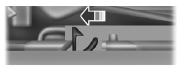 2. Go to the front of the vehicle and release the auxiliary latch that is located