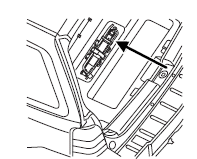 3. Unbuckle the strap and remove the jack and tools by pulling the right side