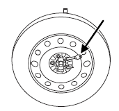 6. If not replacing the spare or flat tire to the underbody storage area, raise